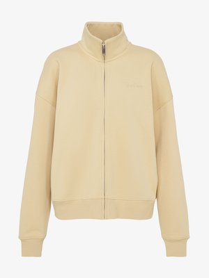 Beige zip-up sweatshirt with high collar, long sleeves, ribbed cuffs, and hem, featuring subtle logo embroidery on chest.