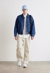 Lacoste Cargo hlače - hammam