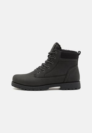 Bottines à lacets - black