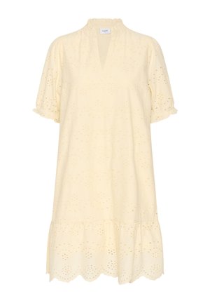 Keltainen puuvillamekko, jossa on röyhelökaula-aukko, lyhyet puffihihat ja silikontiekoristelu. Siinä on kerroksittain leikattu helma ja rento istuvuus.