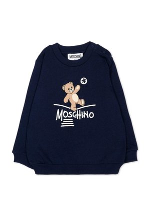 Granatowa bluza dla niemowląt z grafiką misia nad białym logo Moschino, z prążkowanymi mankietami i zatrzaskami na ramionach.