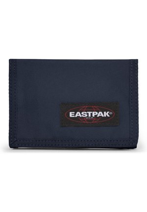Navy blue Eastpak wallet made of durable fabric with stitched edges and a prominent black logo patch featuring a red globe design.