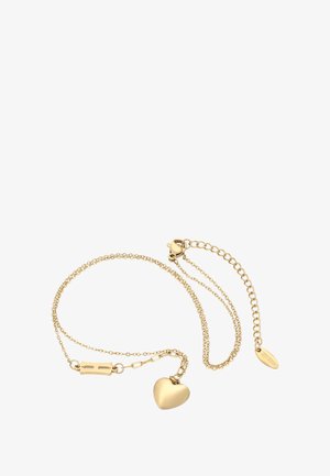 Zarte goldene Kettenarmband mit herzförmigem Charm, Karabinerhaken und verstellbarem Verlängerungskette auf weißem Hintergrund.