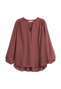 Brun blus med långa ärmar och V-ringning, rynkad detalj vid axlarna och elastiska ärmslut. Tillverkad av lätt och slät tyg.