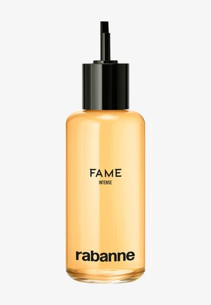 Clear cylindrical amber bottle with black pump dispenser labeled "FAME INTENSE" and "rabanne" on front.
