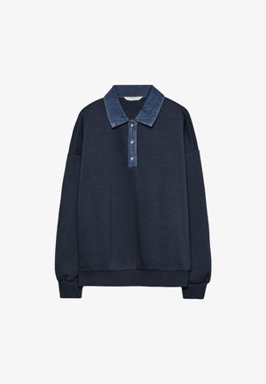 Marineblaues Sweatshirt mit Denim-Kragen, Drei-Knopf-Leiste und lockerer Passform. Weicher Stoff mit gerippten Bündchen und Saum.