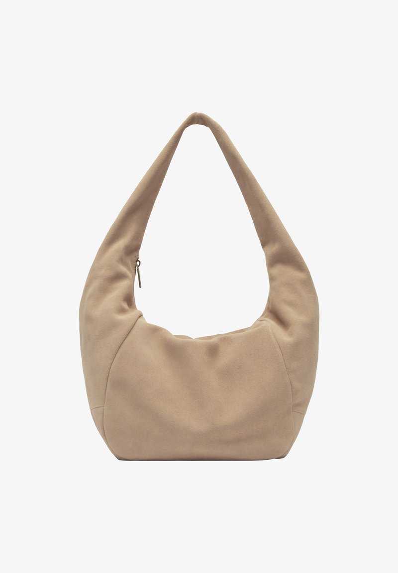 Sac en tissu beige à forme arrondie, avec une seule longue anse et une fermeture éclair. Texture douce et design minimaliste.