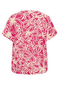 Top a maniche corte realizzato in tessuto leggero con un motivo floreale rosa e crema, dalla vestibilità comoda e con scollatura rotonda.