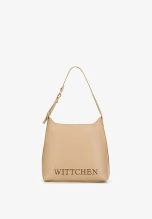 Beige kožená kabelka s oblým tvarem, nastavitelným popruhem a raženým logem "WITTCHEN" na spodní straně. Hladký povrch, minimalistický design.