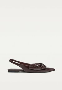 Dark brown leather slingback flat shoe with a pointed toe and gathered detail on top, displayed on a white background.