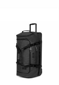 Sac de voyage à roulettes noir en nylon durable, doté de plusieurs compartiments, de fermetures éclair et de poignées rembourrées pour un transport facile.