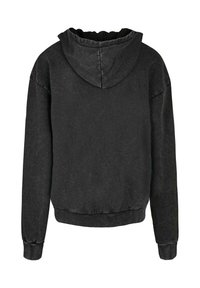 Felpa nera con cappuccio realizzata in tessuto testurizzato, dotata di cappuccio con cordino, polsini e orlo a costine, con una vestibilità rilassata e di un colore uniforme.