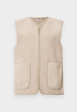 Beige fleece vest med glidelås foran, to frontlommer og v-hals. Myk tekstur med et enkelt, udekorerte design.