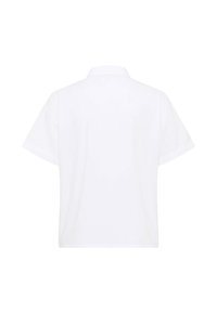 Polo shirt bianco a maniche corte con colletto strutturato, texture liscia e design dritto. Nessun motivo o accessorio visibile.