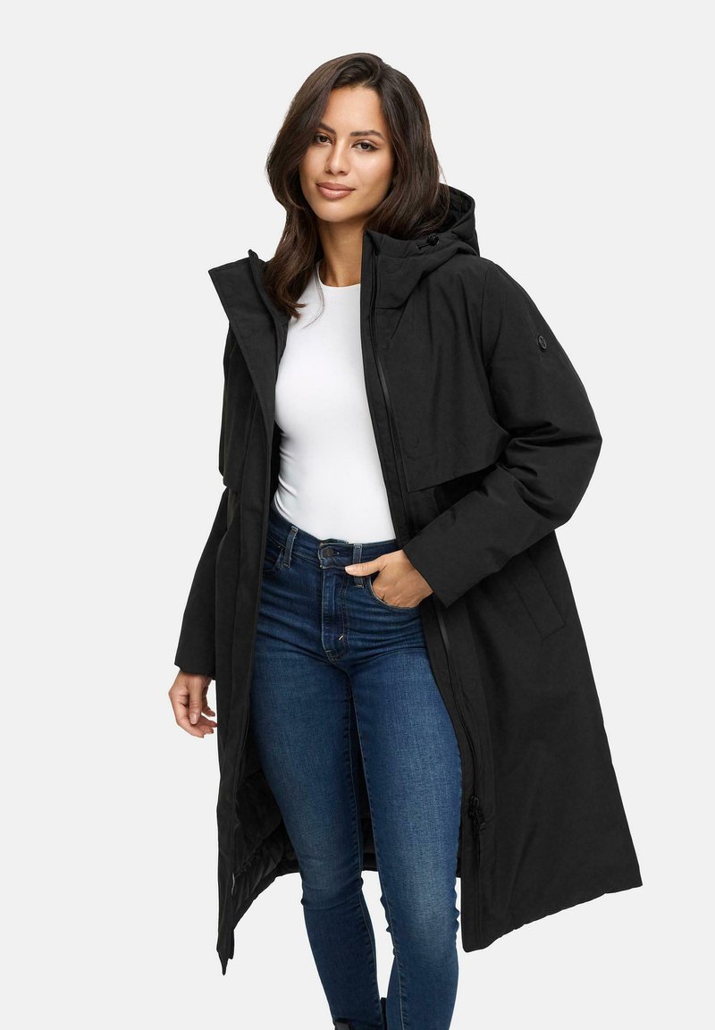 Black long parka with hood, zipper closure, and pockets; features a smooth texture and a relaxed fit, worn over a white top and blue jeans.