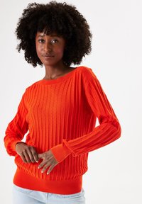 Strickpullover - manderin red