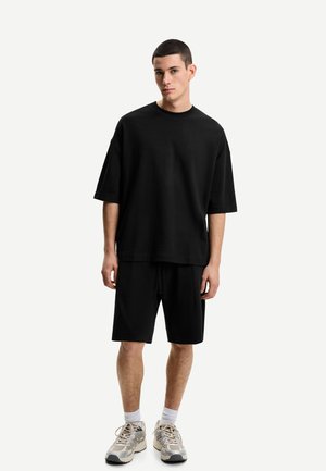 Tracksuit bottoms - black
