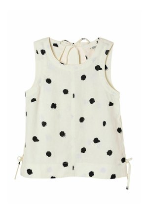 Sleeveless white top with scattered black irregular polka dots, tie closures at back neckline and sides.