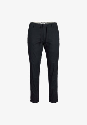 Pantaloni neri in cotone, con vita regolabile tramite cordoncino, vestibilità slim e orli arrotolati. L'interno presenta una fodera a fantasia.