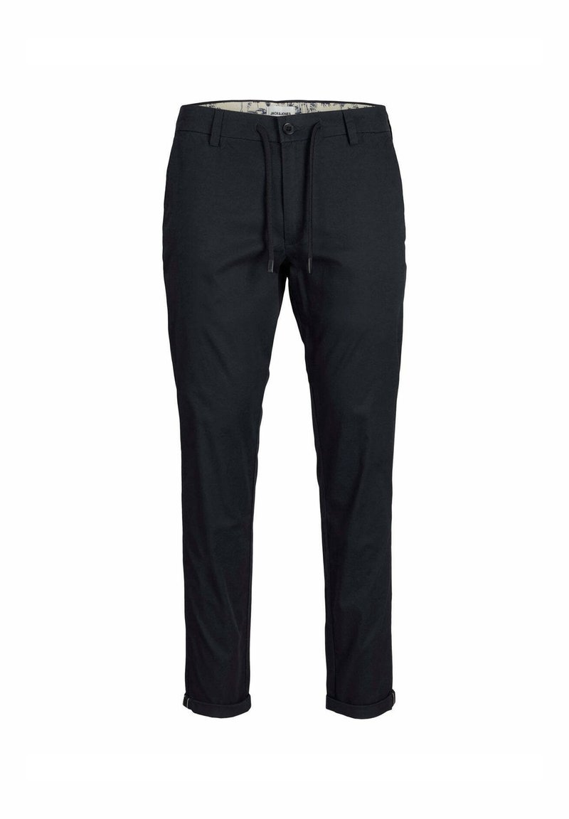 Pantaloni neri in cotone, con vita regolabile tramite cordoncino, vestibilità slim e orli arrotolati. L'interno presenta una fodera a fantasia.