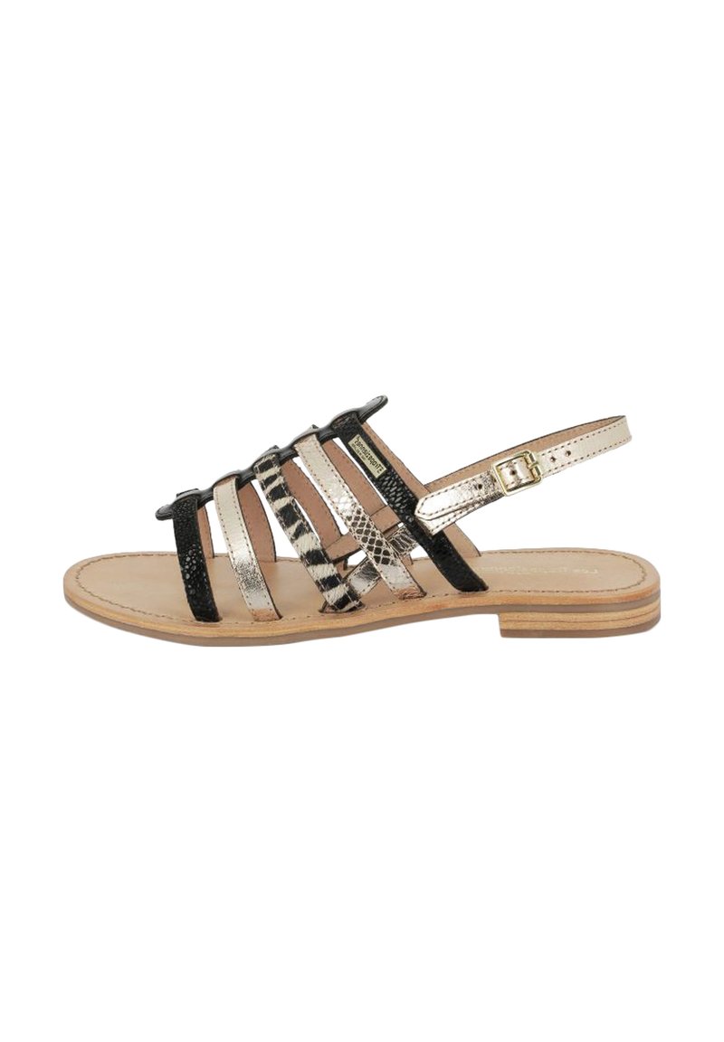 Sandalo con cinturini, base in pelle beige, cinturini neri testurizzati, dettagli metallici e tacco in legno basso. Fibbia regolabile sulla cinghia alla caviglia.