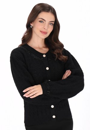 usha, Strickjacke - black
