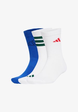 Tre paia di calzini: uno blu uniforme, uno bianco con righe verdi e uno bianco con un logo rosso. Ogni calzino ha una trama a coste.