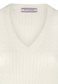 Crème kleurige gebreide V-hals trui met kabelpatroon en een Felix Hardy merklabel op de halslijn, maat small.