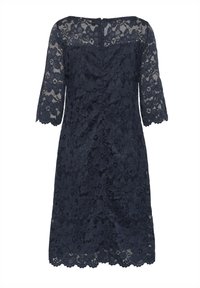 Abito di pizzo navy con maniche corte, corpino aderente e orlo a onde. Pattern floreale su tutta la superficie, con chiusura a fessura sul retro.