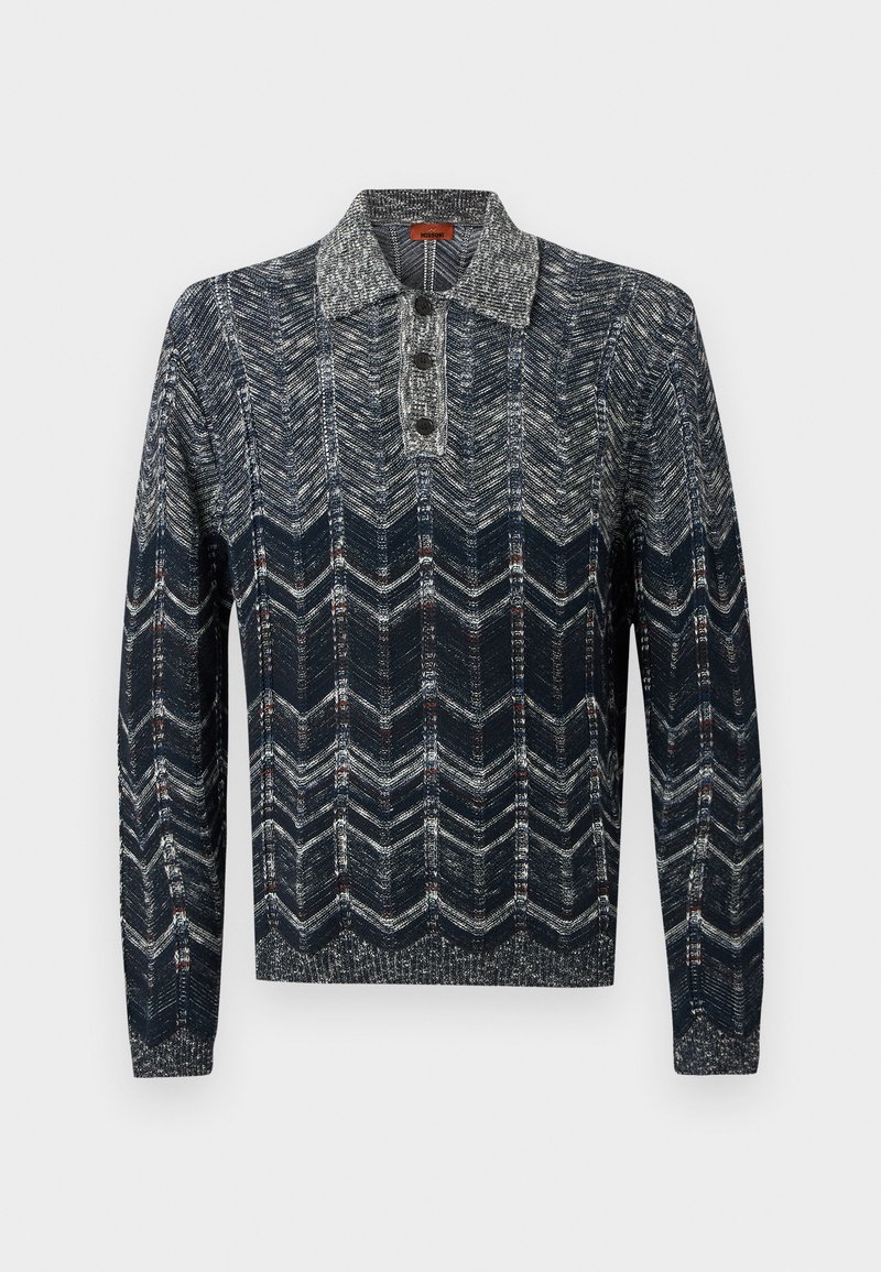 Long-sleeve knit sweater with chevron pattern in shades of navy, gray, and white, featuring a buttoned collar placket.