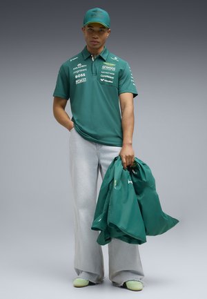 Puma, PUMA X ASTON MARTIN ARAMCO F1® TEAM REPLICA POLO UNISEX - Poloshirt - green lux