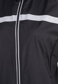 Endurance Runningjack - black