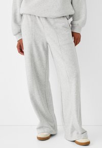 WIDE FUZZY  - Tracksuit bottoms - mottled grey