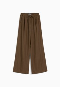 Pantalons marron à jambes larges avec une taille élastique et un cordon de serrage. Fabriqués en matériau doux, dotés de poches latérales et d'une coupe décontractée.