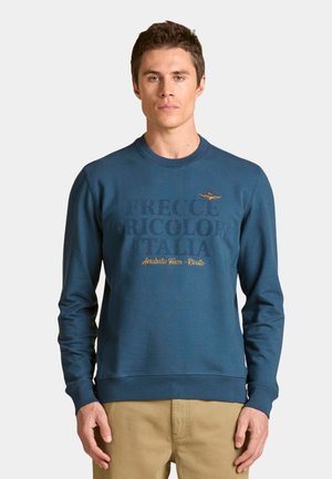 Felpa blu in misto cotone, con scollo rotondo, maniche lunghe e testo stampato con logo sul petto in oro e grigio scuro.