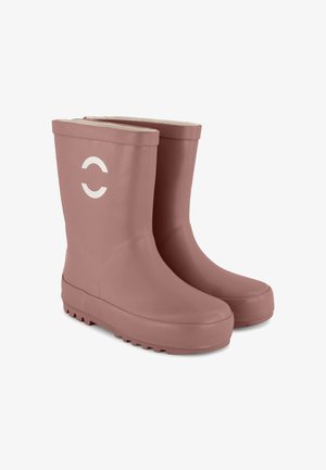 Bottes de pluie en caoutchouc roses avec une finition lisse, un design haut, un logo blanc sur le côté et une semelle extérieure texturée pour l'adhérence. Doublées de matériau doux.