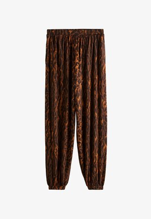 Pantaloni con stampa animalier marrone e arancione, con vita elastica e polsini arricciati, realizzati in un tessuto morbido e leggero.