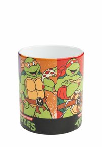 Tazza in ceramica con grafiche delle Tartarughe Ninja. Immagini colorate dei personaggi in verde, marrone, arancione e rosso con dettagli di pizza.