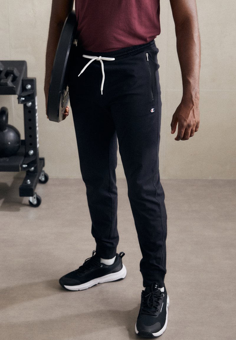 Champion ICON PANTS - Tepláky - black