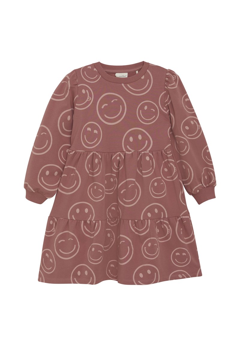Langærmet bomuldskjole i støvet rose, med et lagdelt design og et smiley-ansigt mønster i forskellige størrelser over stoffet.