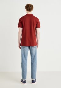 Levi's® Polo marškinėliai - fired brick