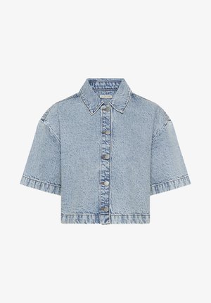 Heledane denimist lühike jakk nupuga ees, lühikesed üleriide suurte varrukatega ja terava kraega. Omab peent tekstuuri ja õmbluse detaile.