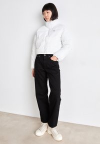 Calvin Klein Jeans HERO 90S STRAIGHT - Straight leg jeans - classic black