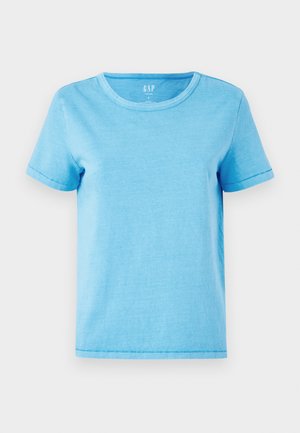 Lysblå bomulds T-shirt med rund halsudskæring, korte ærmer og synlige stikninger ved kantene. Enkel, udekoreret design.