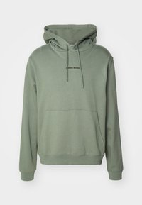 Unselected, agave green