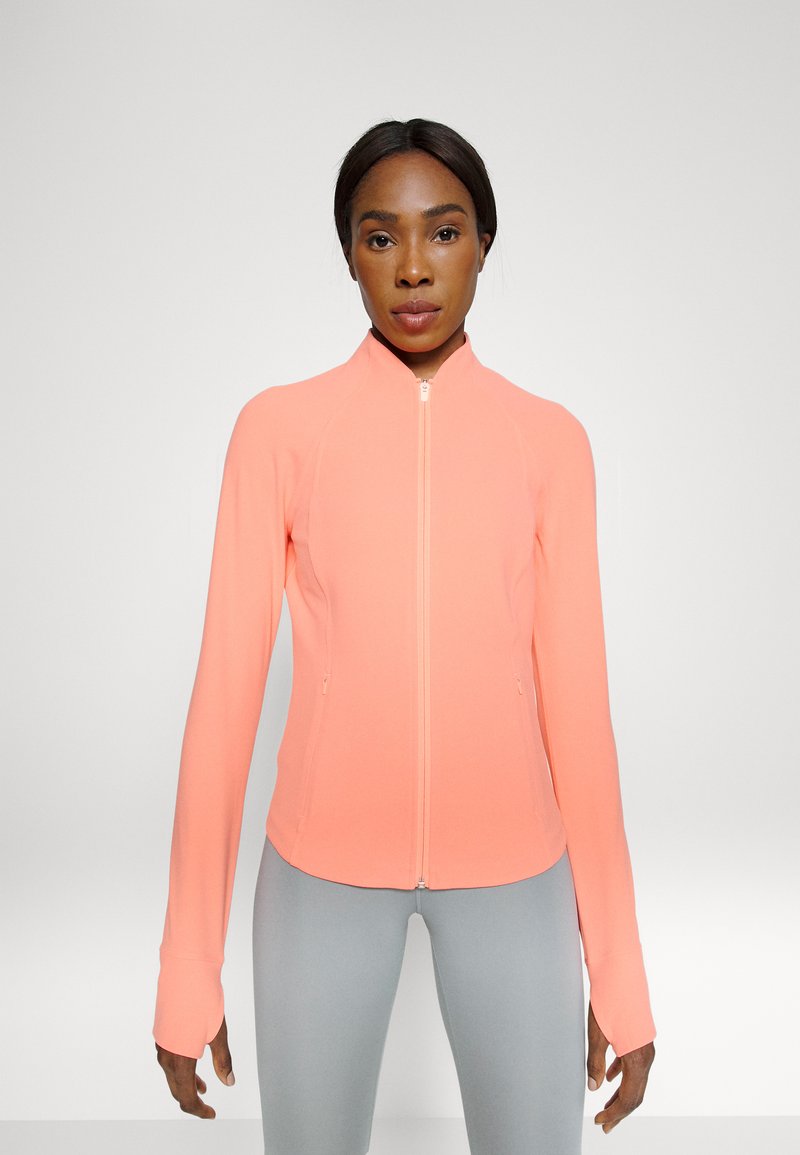 Athleta SALUTATION JACKET Training jacket sunset glow/red Zalando.de