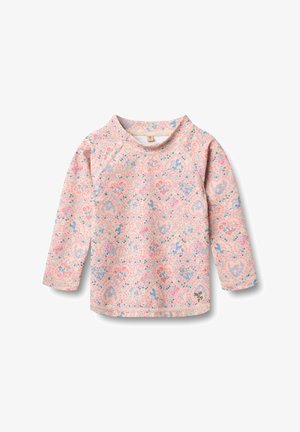 Maglietta per neonati a maniche lunghe con motivi a cuore floreali rosa e viola, scollo arrotondato e piccolo logo WHA vicino all'orlo su sfondo bianco.