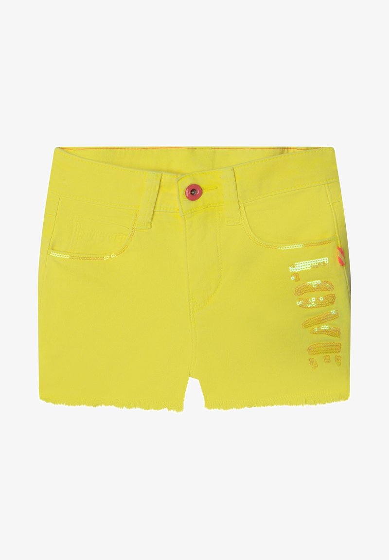 Žluté denimové šortky s třepeným lemem, se růžovým knoflíkem a detaily z flitrů na pravé straně. Obsahují čtyři kapsy.
