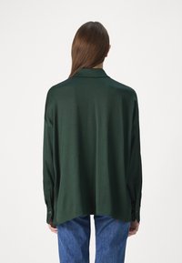 DRYKORN CLOELIA - Blúzka so zapínaním na gombíky - green
