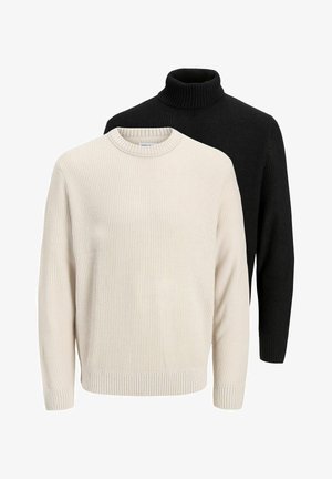 Twee gebreide truien: de ene is crème met een ronde hals, de andere zwart met een col. Beide hebben ribgebreide manchetten en onderkanten.